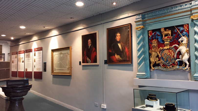 Internal white wall with filled picture frames of various sizes