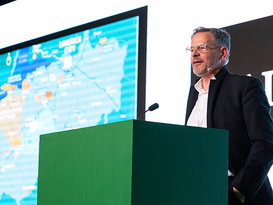 Mayor of Limerick, John Moran speaking at a green podium