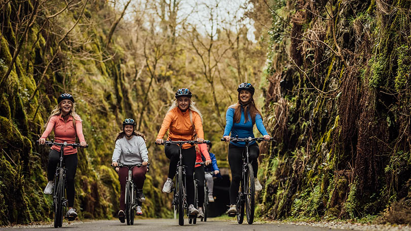 Group of friends cycling on Limerick Greenway 