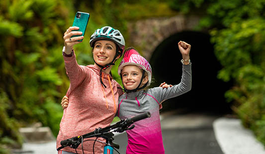Woman taking a selfie with her daughter on Limerick Greenway