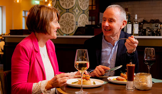 Couple having dinner in the Spitjack Limerick