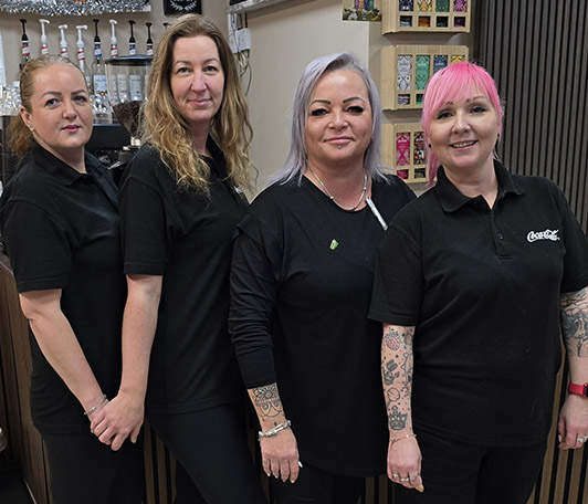 The Arra Cafe Owner, Vera