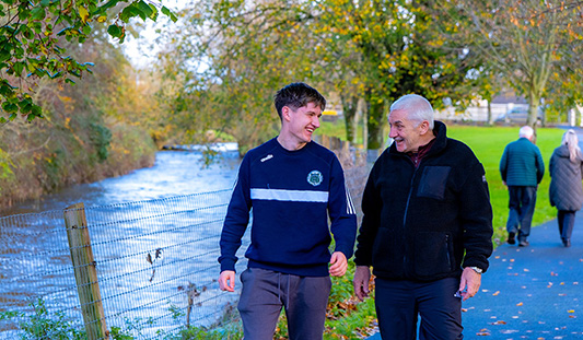 Two men walking by the river in Kilmallock, Co. Limerick