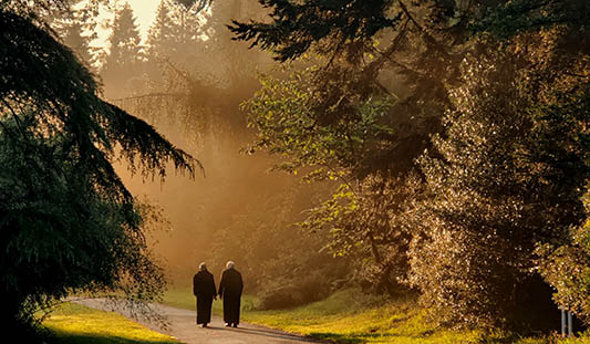 Two monks walking in Glenstal Abbey, Murroe, Co. Limerick. Photographer Linda Higgins