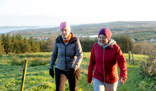 Two women walking on the Knight's Walk in Glin, Co. Limerick