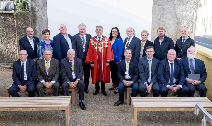 Mayor of Limerick, John Moran and Priomh Chomhairleoir, Cllr Tom Ruddle pose with members of the Dromcollogher 26 Committee and Local Elected Representatives in the new Dromcollogher Memorial Library Garden
