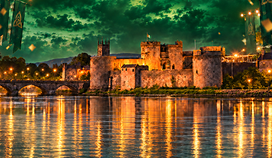 Image of King John's Castle in Limerick enhanced with green and orange 'Halloween' themed lighting